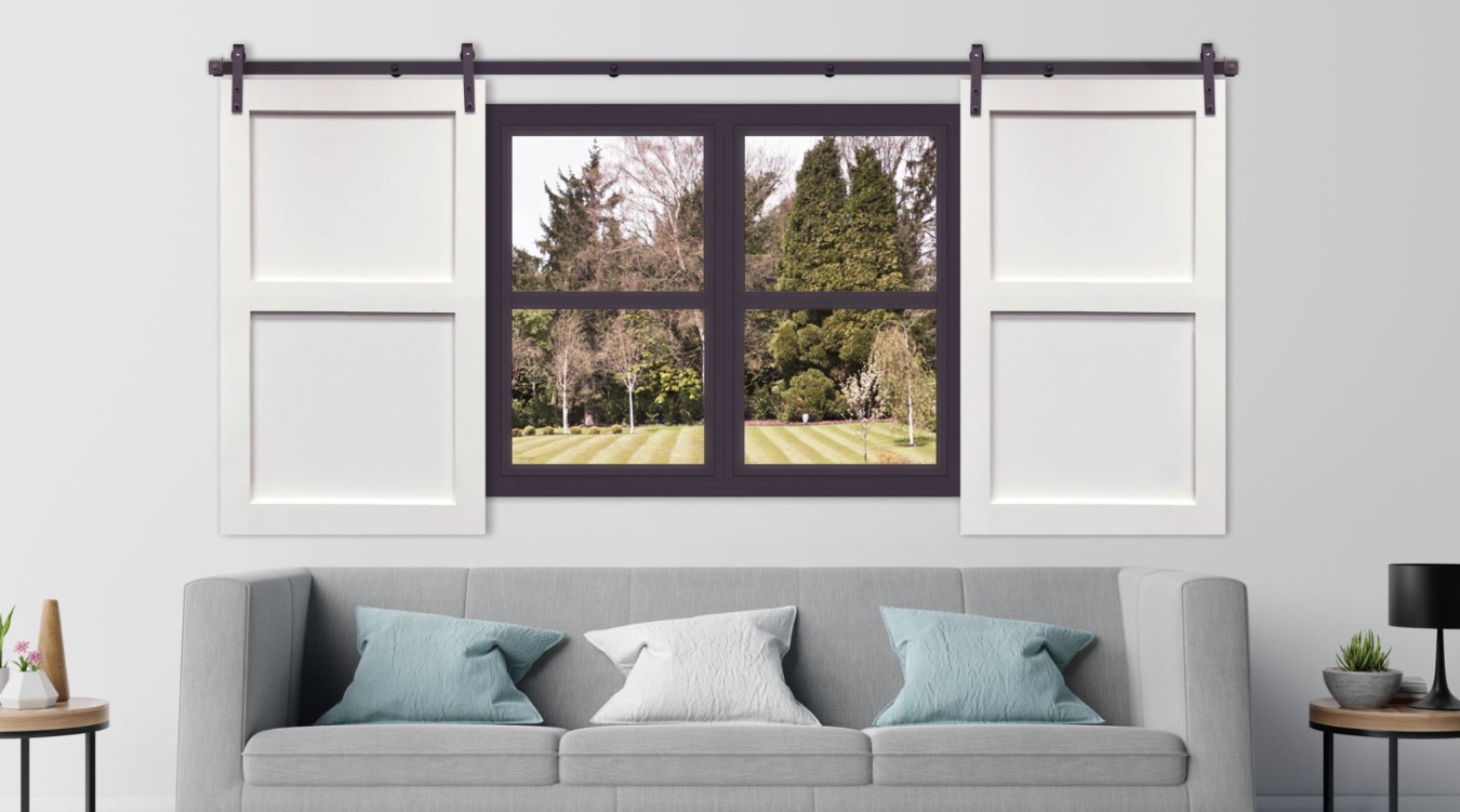 White barn door shutter in streamlined Phoenix living room